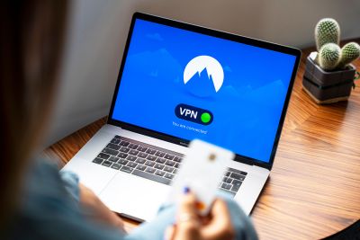 A laptop with a VPN graphic on the screen