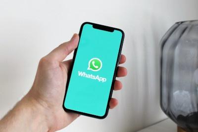 Phone with WhatsApp open