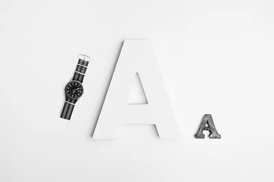 2 capital "A"s in different typefaces on a white background