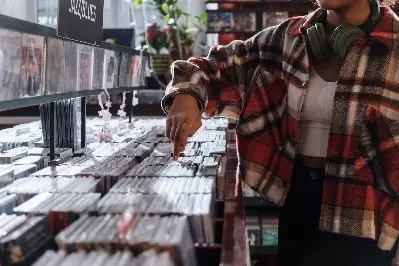 Racks of CDs in a shop