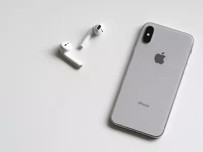 iPhone and iPods on a white table