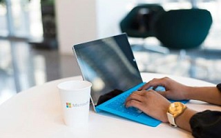 Someone using a Microsoft Surface laptop